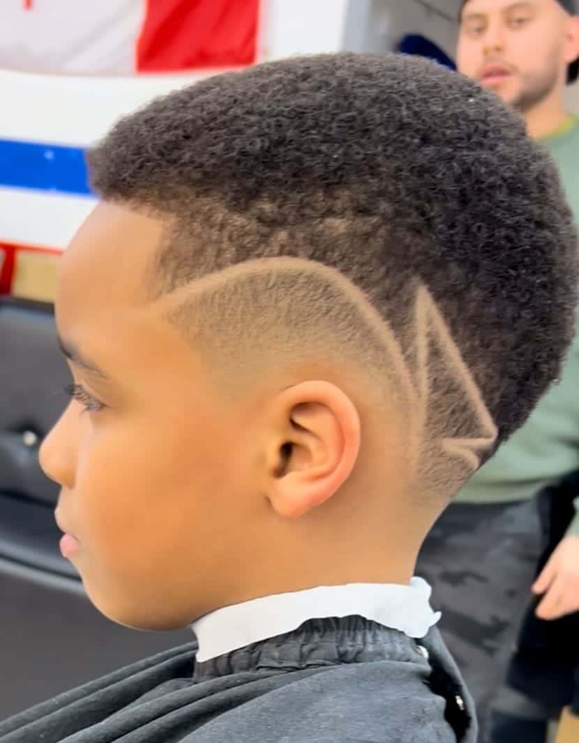 Freestyle eagle design razored into a low fade — corte con diseño de águila, Toronto barbershop